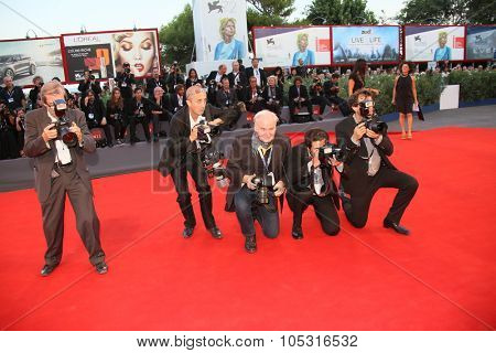 Photographer attend a premiere for 'Per Amor Vostro' during the 72nd Venice Film Festival at Palazzo del Casino on September 11, 2015 in Venice, Italy.