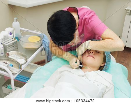 Cosmetology procedure mesoteraphy. Rejuvenation revitalization, skin nutrition, wrinkle reduction. D