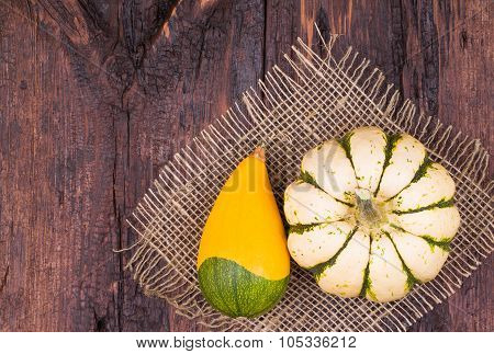 Pumpkins On A Wooden Table