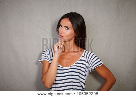 Pensive Lady Contemplating While Looking At Camera