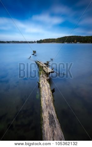 Long Exposure Landscape Of Lake Shore