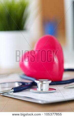 Medical Stethoscope Head And Red Toy Heart