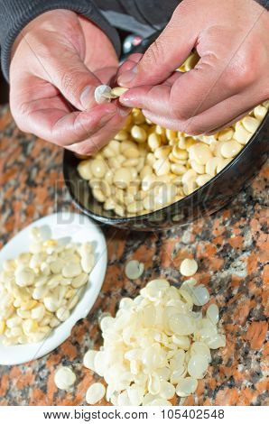 Closeup peeling, before and after bowls with lupini beans superfood, part of legum family, preparing