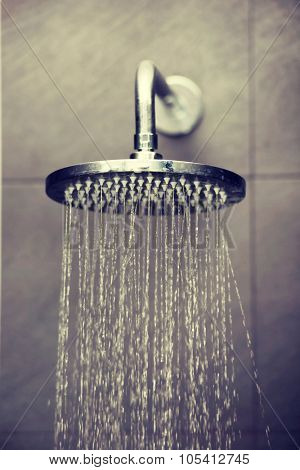 Shower head with water stream.
