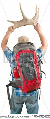 Tourist man with backpack standing with horns on scenerywhite background