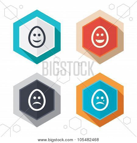 Eggs happy and sad faces signs. Easter icons.