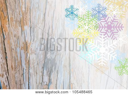 Wooden Plank Background With Colorful Snowflake