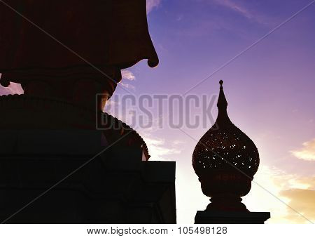 Silhouette Of Statue Of Flowers On Lotus-shape In Tray