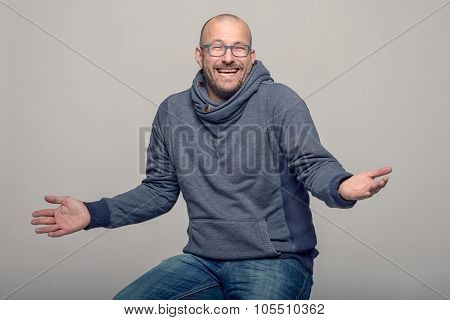 Charismatic Man Shrugging His Shoulders
