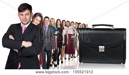 Black briefcase foreground and business peole