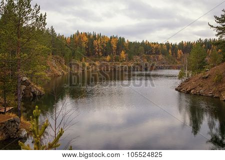 Flooded Quarry Near The Town Of Nizhny Tagil, Sverdlovsk Region, Autumn