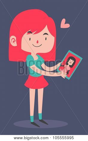 Cute Girl Holding Her Girlfriend's Portrait