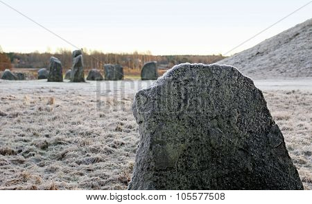 The Big Stones Standing In The Snow Field In Winter