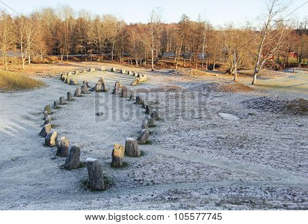The Big Stones Standing In The Snow Field In Winter