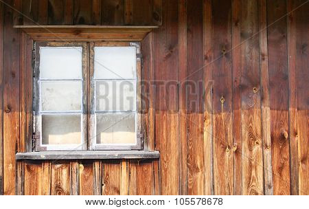 The Old Window In The Wooden Gouse Wall