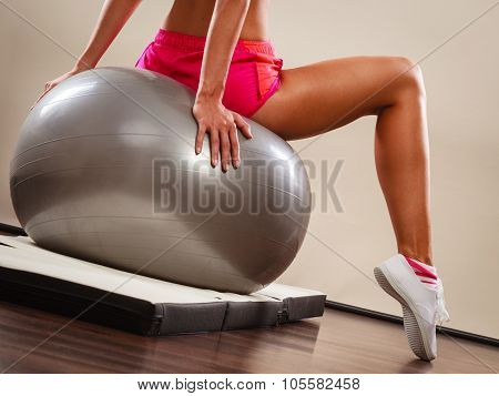 Woman Doing Fitness Exercises With Fit Ball