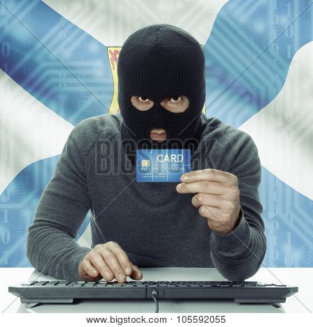 Dark-skinned Hacker With Canadian Province Flag On Background Holding Credit Card - Nova Scotia