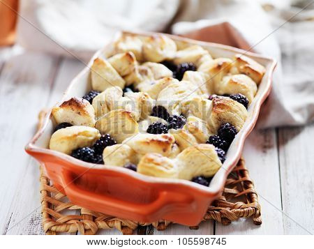 blackberries and creamcheese with baked biscuit wedges casserole