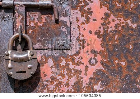 surface of rusty iron with remnants of old paint background