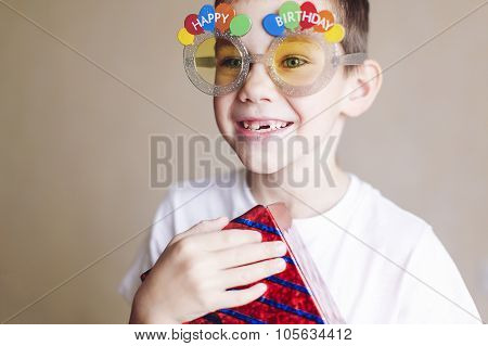 boy accepts congratulations on the birthday