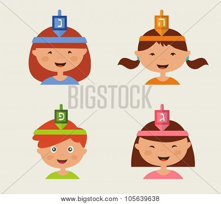 children celebrating Hanukkah . Hebrew letters on a Hanukkah dreidel, which stand for the phrase, A