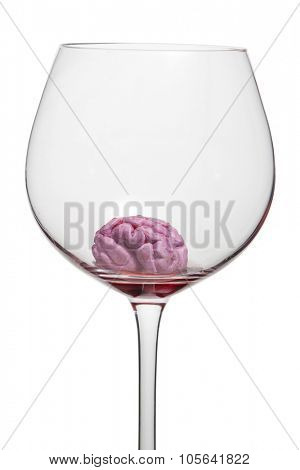 Glass with red wine shows that alcohol kills cerebral cells. For social advertising. 