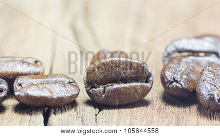 Coffee Beans  Texture  On The Wood Background