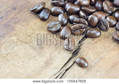 Coffee Beans  Texture  On The Wood Background