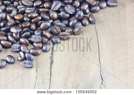 Coffee Beans  Texture  On The Wood Background