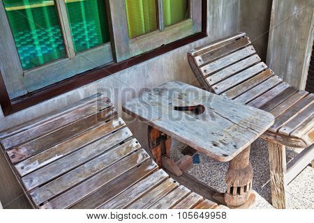 smoking pipe on wooden table on teracce