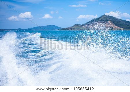 Water stream after speed boat. Summer landscape, a warm Sunny day on the Islands in Asia