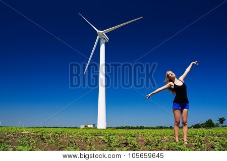 Female At Wind Power Generator