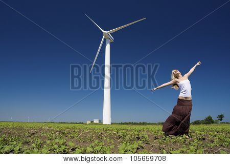 Female At Wind Power Generator