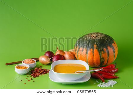 Pumpkin Soup With Onion And Pepper On Green Shadowless Backgroud