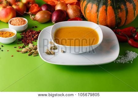 Pumpkin Soup With Onion And Pepper On Green Shadowless Backgroud