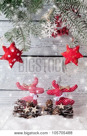 Christmas still life decoration with cariboo on wooden background