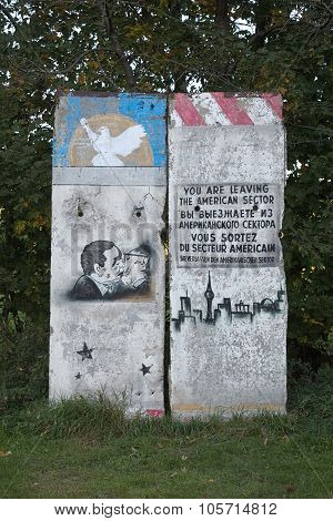 A Part Of The Former Berlin Wall With Historic Graffiti