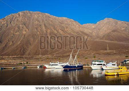 Boats And Yachts Are In The Harbor.