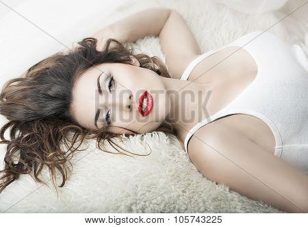 Beautiful Sexy Relaxing Brunette Woman Lying In Bed