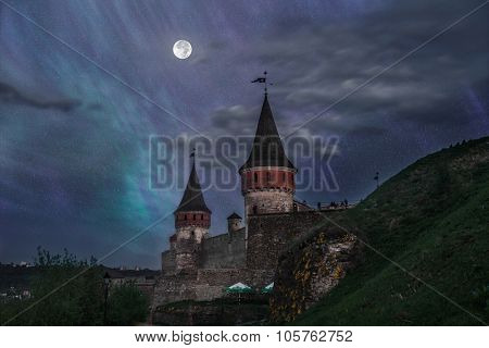 View on the castle in Kamianets-Podilskyi in the nigth Ukraine