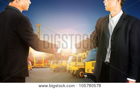 Business Man Shaking Hand With Successful Agriment In Container Dock And Shipping Transportation Bus