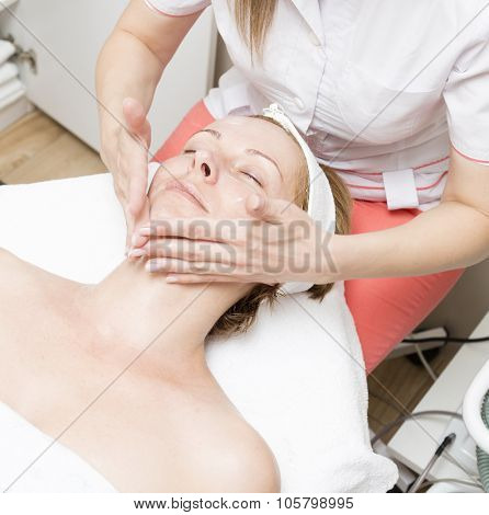 Woman on cosmetics treatment
