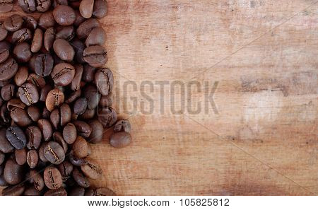 Roasted Coffee On A Wooden Background