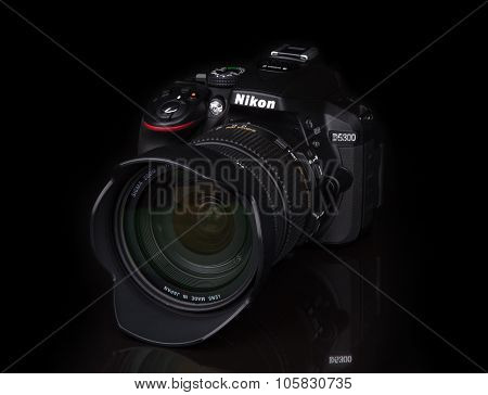Kyiv, Ukraine - June 19, 2015: Nikon D5300 Camera With Sigma 17-50Mm F2.8 Lens On Black Background