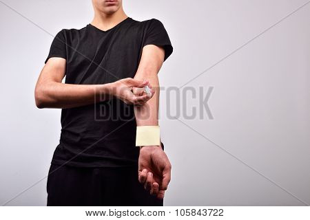 Hand With Heroin Syringe With Blank Post It. The Concept Of Not Starting To Use Drugs