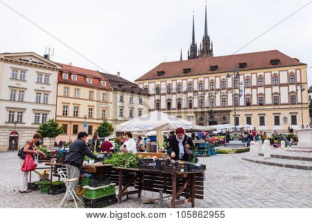 People Buy Vegetables At Cabbage Market In Brno