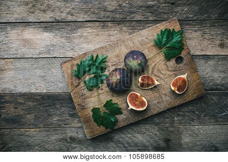 Tasty Figs On Chopping Board