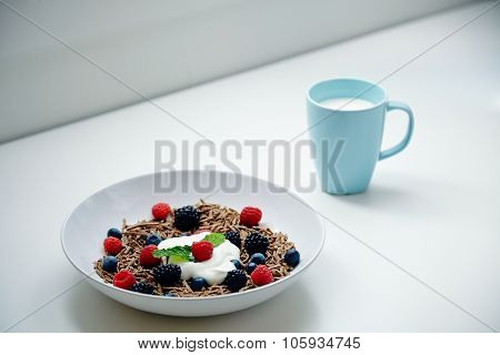 Breakfast With Glass Of Mik And Integral Musli With Berries Mix On Blank Table
