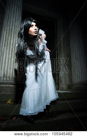 Witch from a crypt in the cemetery