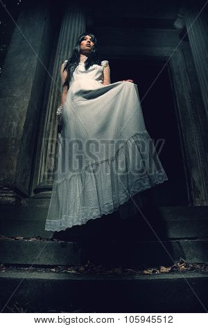 Witch from a crypt in the cemetery